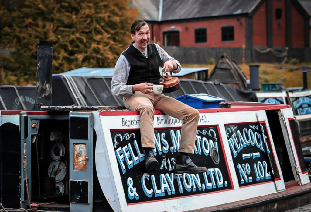 A man on a canal barge at black country living museum